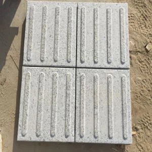 Rajola tàctil de granit G640
