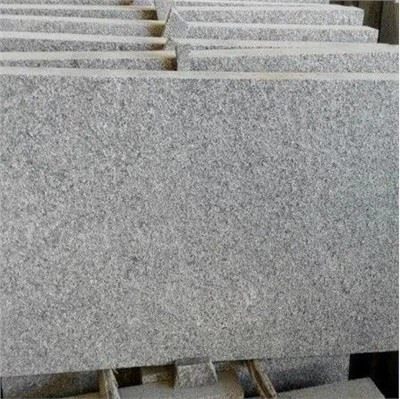 Lloses de granit gris fosc G654